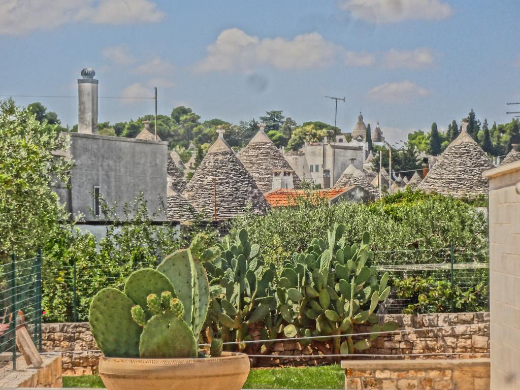 Trulli-Eu Guesthouse ألبيروبيللو الغرفة الصورة