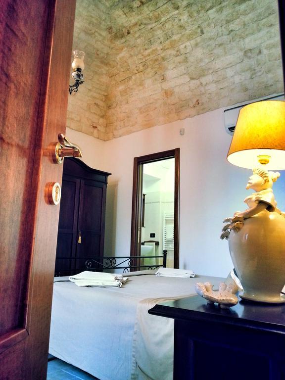 Trulli-Eu Guesthouse ألبيروبيللو الغرفة الصورة